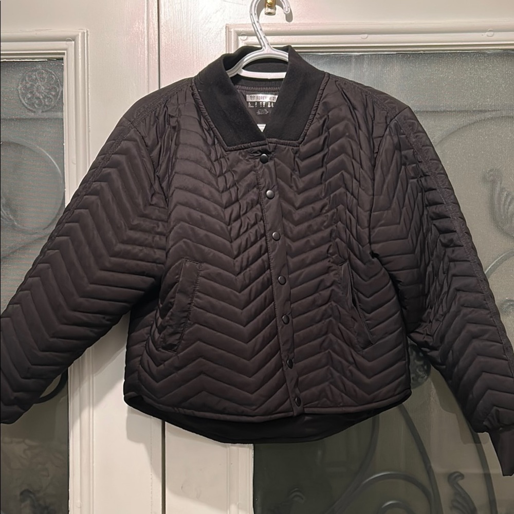 Black Quilted Bomber Jacket with Chevron Pattern